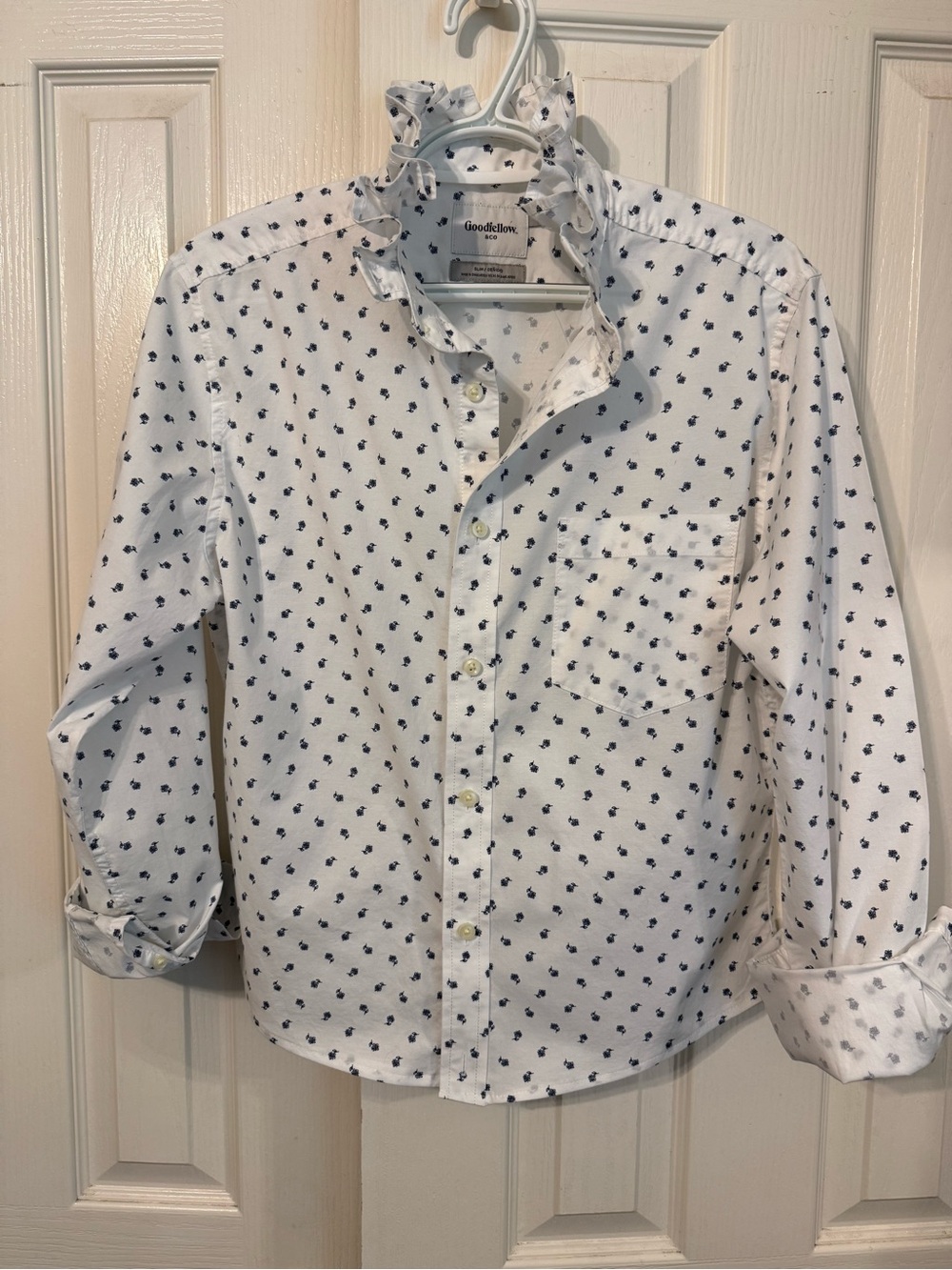 Woman’s Ruffle Collar White Button-Down Shirt with Navy Print
